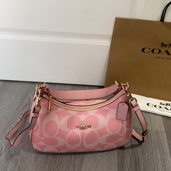 Teri Hobo Bag In Signature Canvas Pink CAL52