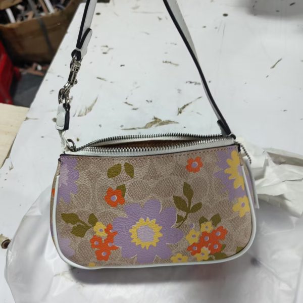 Nolita 19 In Signature Canvas With Floral Print CBM73